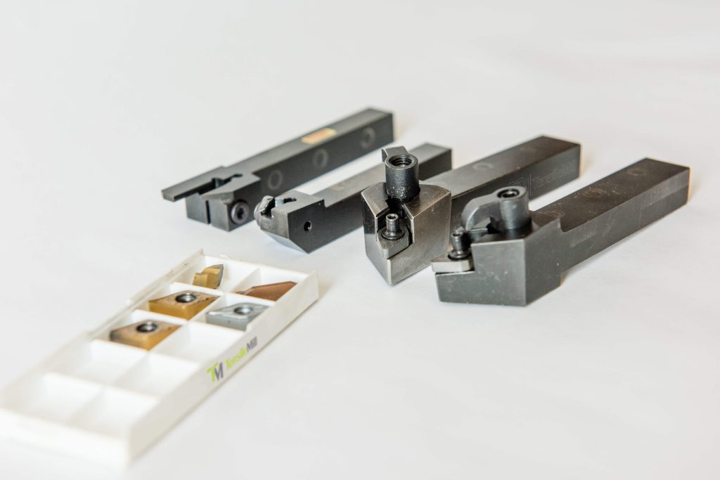 Cutting Inserts and Fixtures for Aluminum and Soft Metal Specimens